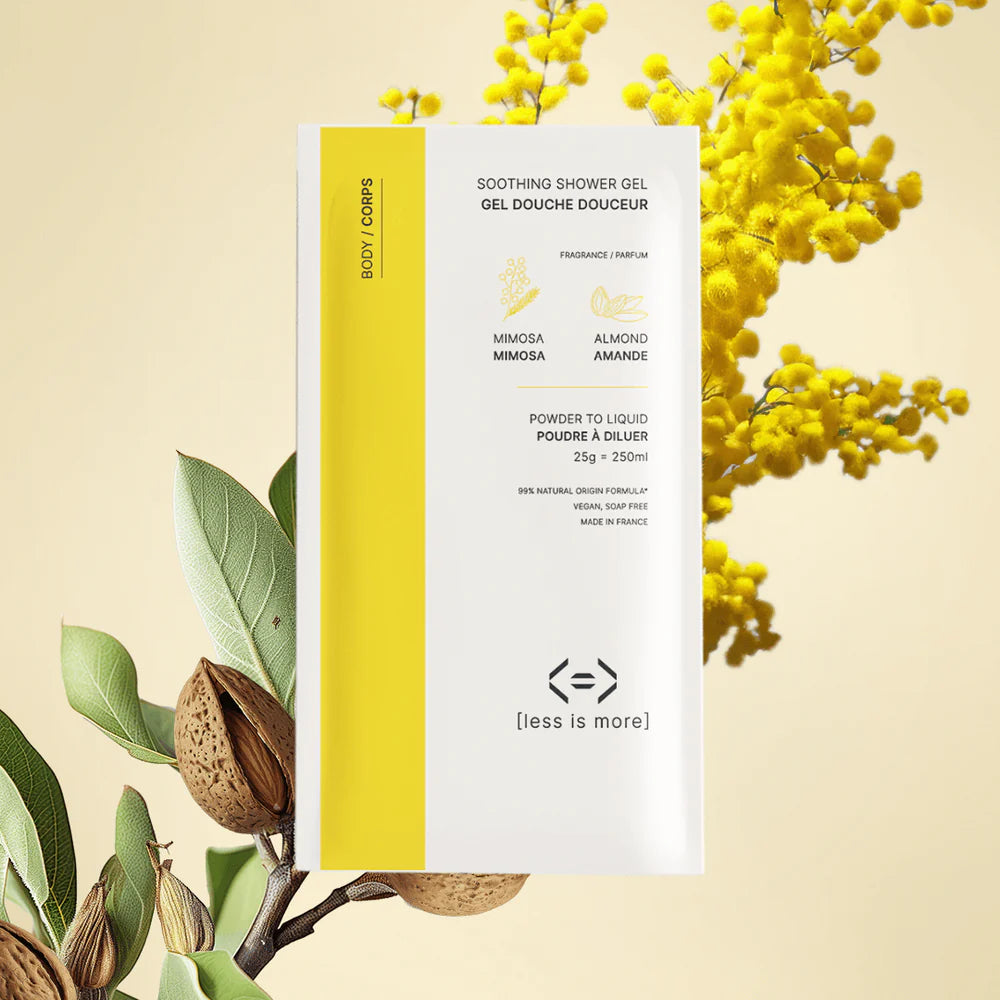 Recharge de gel douche Less is More au mimosa et à l’amande, formule en poudre pour une douche douce et réconfortante.