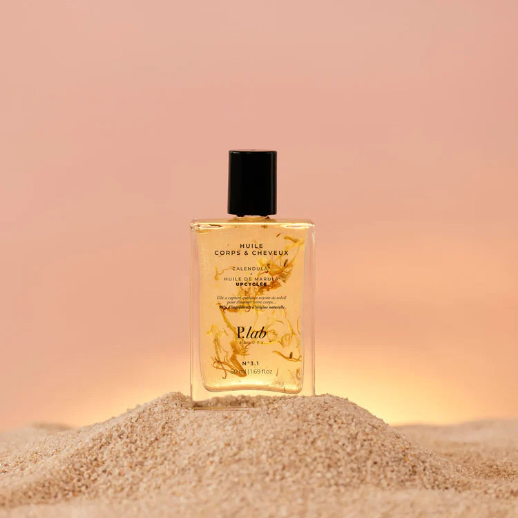 Huile corps et cheveux P.Lab Beauty, soin satiné aux nacres dorées pour sublimer la peau et les longueurs.