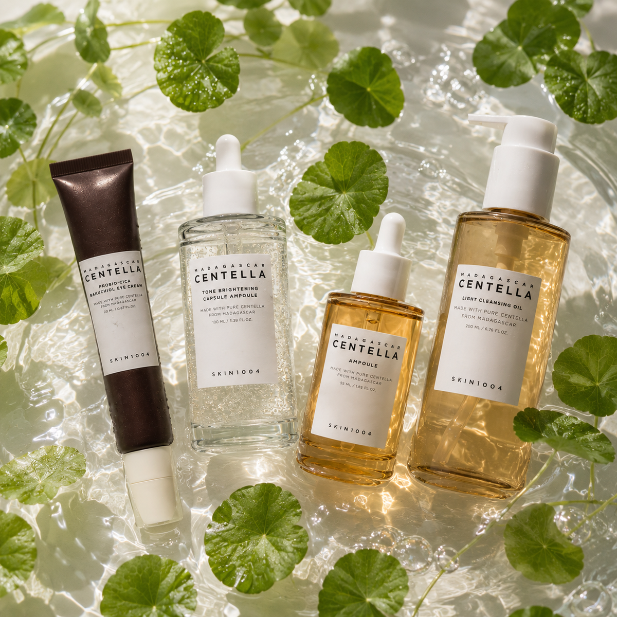 Différentes lignes de soins SKIN1004 présentées de façon structurée pour illustrer une routine pensée par besoin de peau.